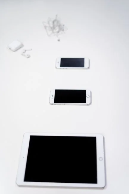 Businesswoman working on laptop with Android 6.0 Marshmallow webpage open.